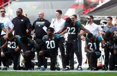 Here's how everyone's reacting to 200 NFL players protesting in defiance of Donald Trump