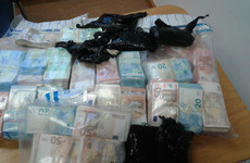 €400k in cash seized from house in Ballymun, along with gun and cocaine