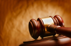 Man who broke into estranged partner's home and made threat to kill has jail term cut