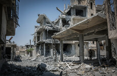 US-backed forces declare victory over the Islamic State's former 'capital'