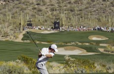 McIlroy and Westwood on course for duel in the desert