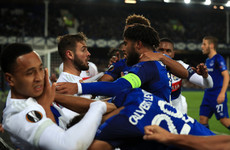 Everton bans supporter who appeared to strike a Lyon player while holding a child