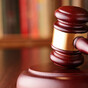 Double-murder trial hears two bullets recovered from skulls of men found in burning car