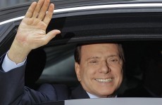 Italian court throws out bribery case against Berlusconi