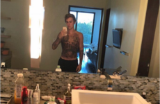 Justin Bieber fans are sending his tattoo artist hate after Bieber revealed his latest tattoo