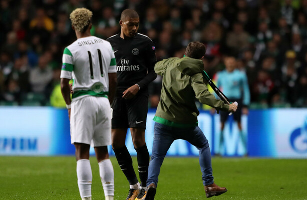 Uefa fine Celtic after fan invades pitch and attempts to kick PSG striker Mbappe