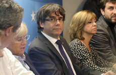 Catalan leader says he isn't in Belgium to claim asylum, but rather for 'safety purposes and freedom'