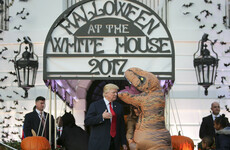 The photos of Donald Trump completely ignoring a kid dressed up as a dinosaur are just brilliant
