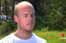 British doctor escapes Australian shark attack by 'punching it in the face'