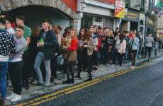 Here's why students are standing in massive queues outside Galway pubs today