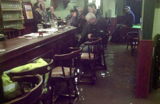 A pub in Co Laois flooded after heavy rain, but that didn't stop the regulars having a pint