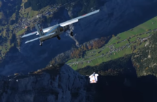 Wingsuit flyers pull off outrageous stunt by BASE jumping right into a moving plane