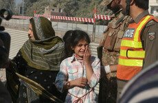 Nine killed and dozens injured after burqa-clad gunmen storm Pakistani college