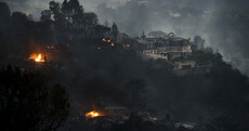 Mansions belonging to Beyonce and Rupert Murdoch among those evacuated due to wildfires