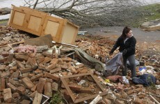 Toddler found alive in field after tornado dies
