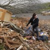 Toddler found alive in field after tornado dies