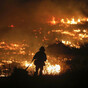 'I didn't know if we'd make it': Homes and horses burned as 200,000 flee wildfires in California