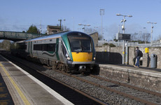 A passenger called 'a liar' by an inspector has settled a defamation case against Irish Rail