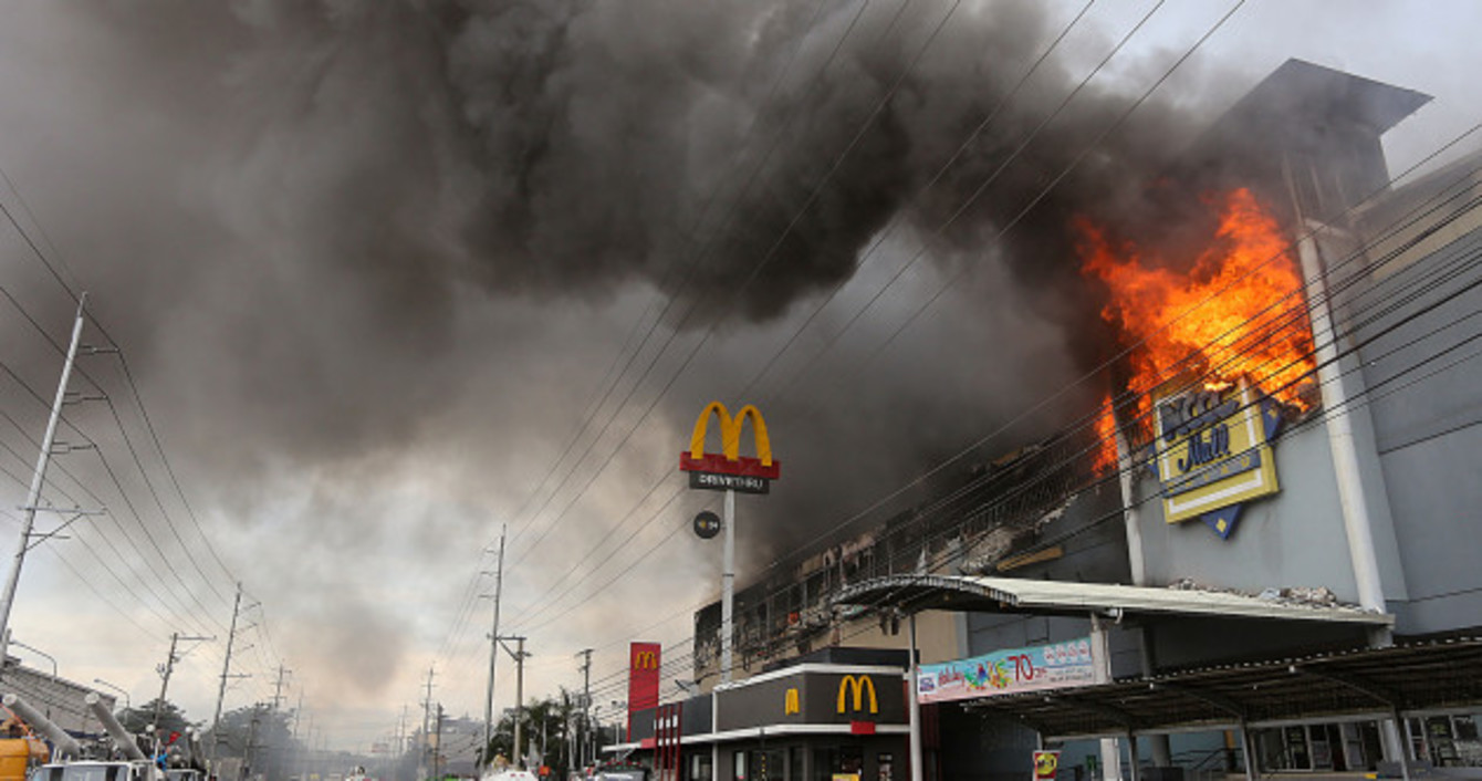 At least 37 dead in fire at Philippines shopping centre 