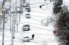 A white Christmas: Record-breaking 60 inches of snowfall has completely buried this US town