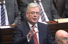 Gilmore criticised for “back-slapping fest” to mark one-year anniversary