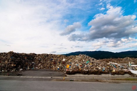 Piles of debris in Japan as it attempts to rebuild in the aftermath of the unprecedented disaster a year ago.