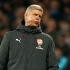 Wenger charged after confronting officials