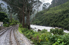 River searched for 16 missing people after Peruvian bridge collapses into valley