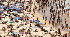 Power cuts and fire bans as Sydney swelters in hottest temperatures since 1939