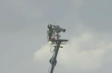 WATCH: Wayward drive improbably hits cameraman