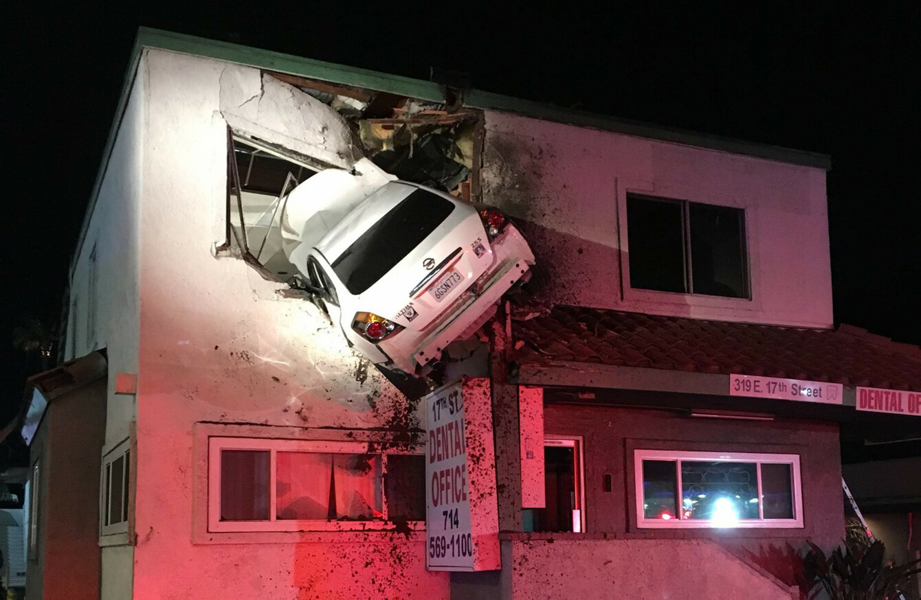 Car flies into first floor of Californian office building