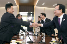 Hand of friendship: North and South Korea will compete together at the Winter Olympics