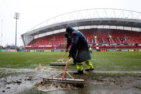 Ground staff are currently working to dry the surface.