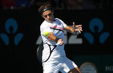Defending champion Federer maintains flawless record to reach quarter-final