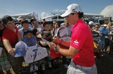 Rory McIlroy hangs on to No 1 as Rose breaks top 10