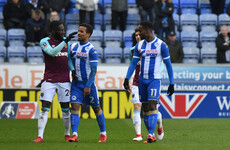 West Ham's Masuaku sent off for spitting as Will Grigg-inspired Wigan cause FA Cup upset