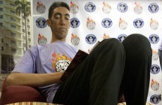 Academics stop world's tallest man - 8'3" - from growing