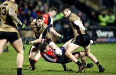 Kerry finish with 13 men but hold strong against Mayo to claim victory in Castlebar