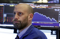 Wall Street just took a huge plunge and traders are trying to stay calm