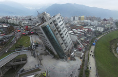 Pictures: Search for survivors in precariously-tilted buildings after Taiwan earthquake