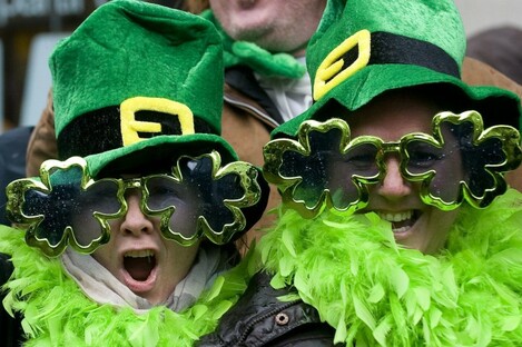 Colourful spectators enjoy the festivities at the 186th consecutive St. Patrick's Day parade in Montreal 2010.