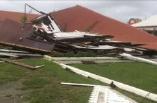 Powerful storm levels Tonga's parliament house and heads towards Fiji