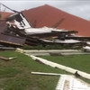 Powerful storm levels Tonga's parliament house and heads towards Fiji
