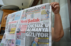 Turkey court jails top journalists for life over coup links