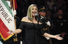 Fergie has apologised for her rendition of the national anthem that left celebrity audience members laughing