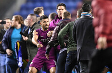 Wigan to investigate pitch invasion after win over Manchester City