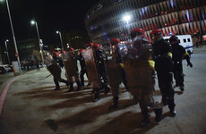 Police officer dies as fans involved in violent clashes during Europa League game in Bilbao