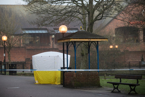 A forensic tent stands over a bench in Salisbury where the man and woman were found unconscious 