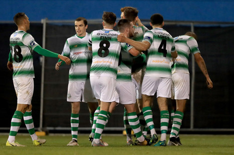 The Rovers players celebrate their goal. 