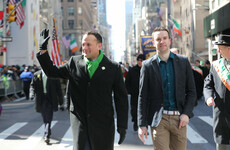 Leo Varadkar marches with his partner in the St Patrick's Day parade in New York
